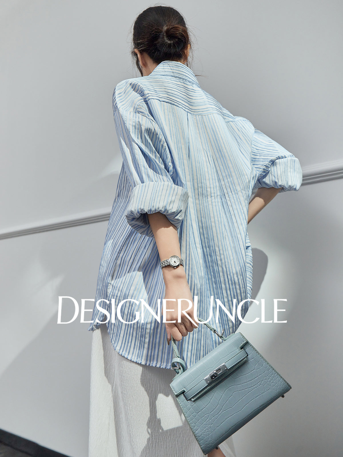 DGU| Blue Knitted Loose Vertical Light Luxury Commuter Fan Niche Design Top - George.