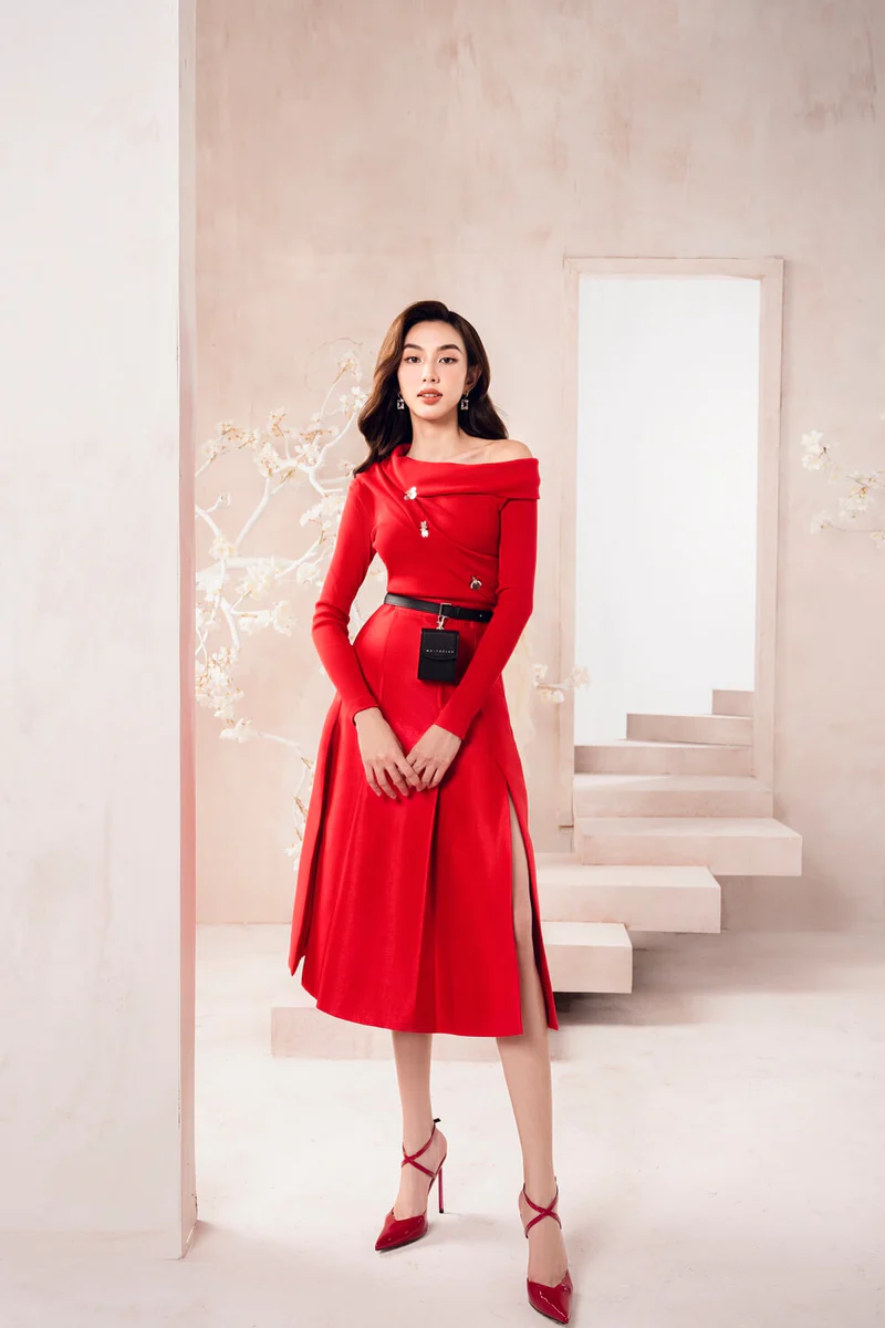 Elegant draped body long sleeved asymmetric shoulder top- Catia