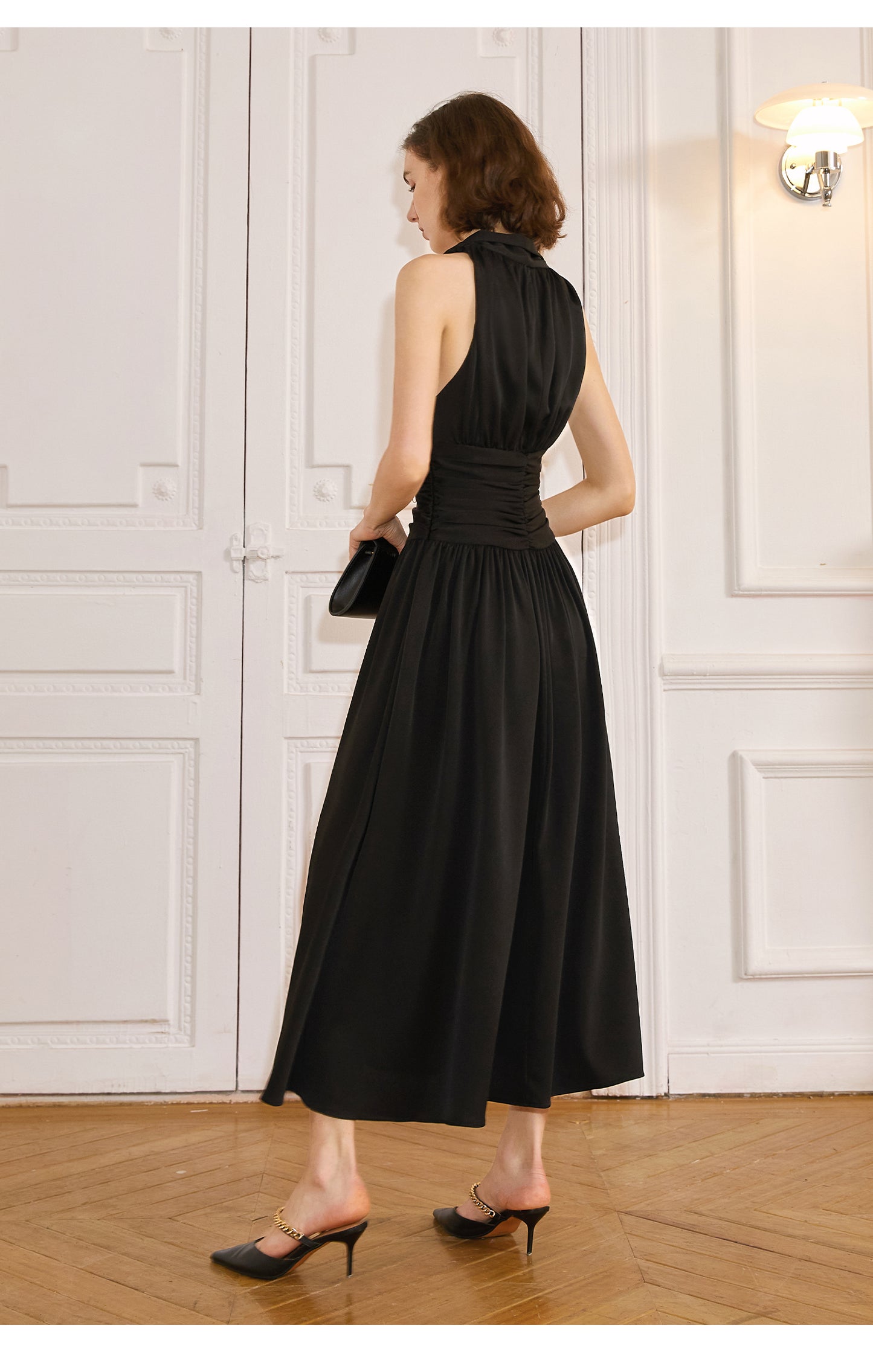 Luxurious blend of silk a hanging neckline, and sleeveless V-neck dress- Besame