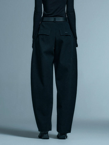 ANNAKIKI mid-waisted wool scimitar mid-rise trousers-ITSUKI