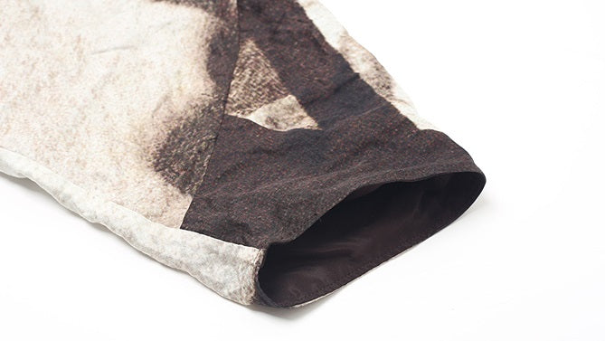 ZHUCHONGYUN stork leaf autumn song curved hem top--LUPIN.