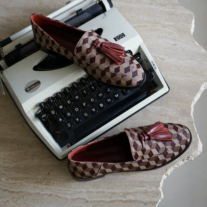 B-FEI British-style round toe loafers.