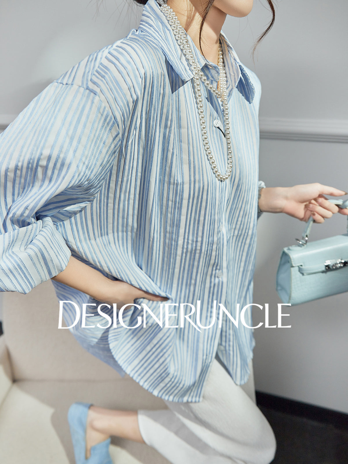 DGU| Blue Knitted Loose Vertical Light Luxury Commuter Fan Niche Design Top - George.