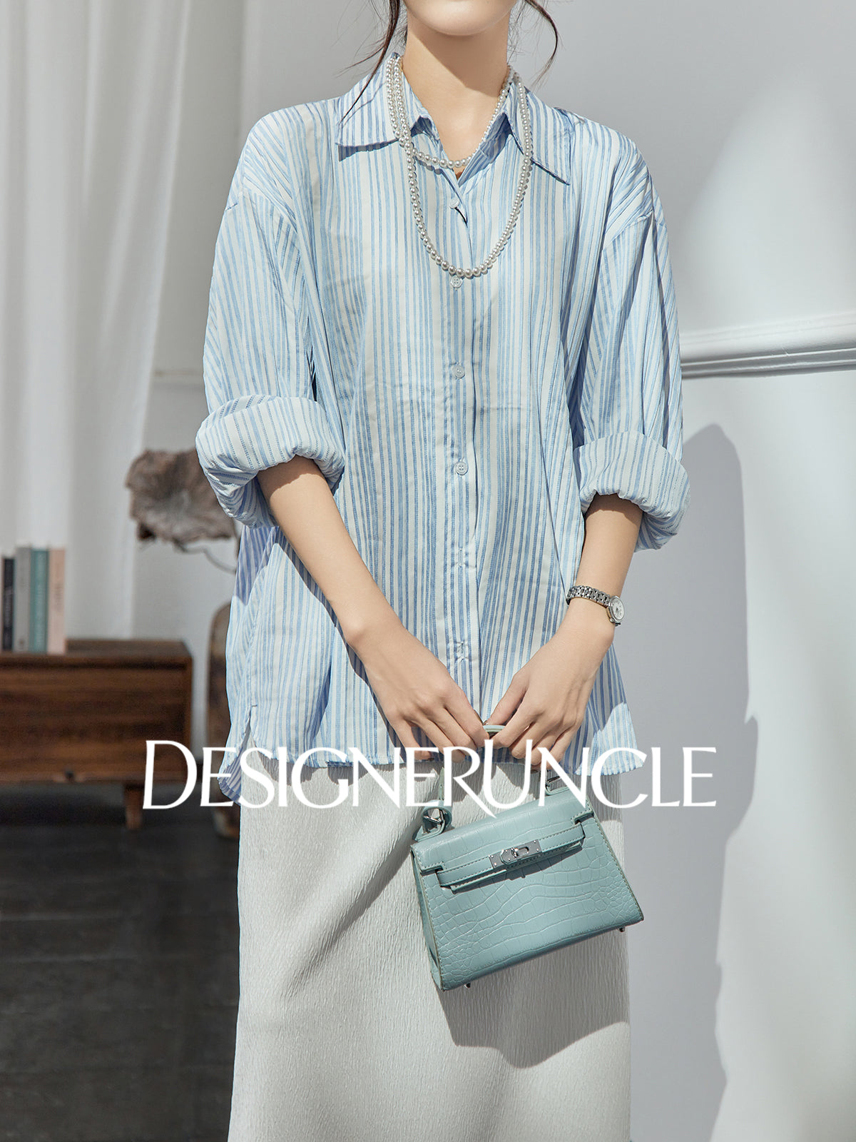 DGU| Blue Knitted Loose Vertical Light Luxury Commuter Fan Niche Design Top - George.