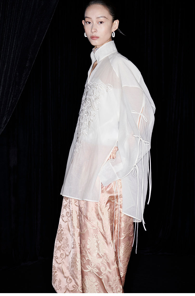 M essential Mackay designer soft-paper pale overshirt with pavement embroidery - serious.