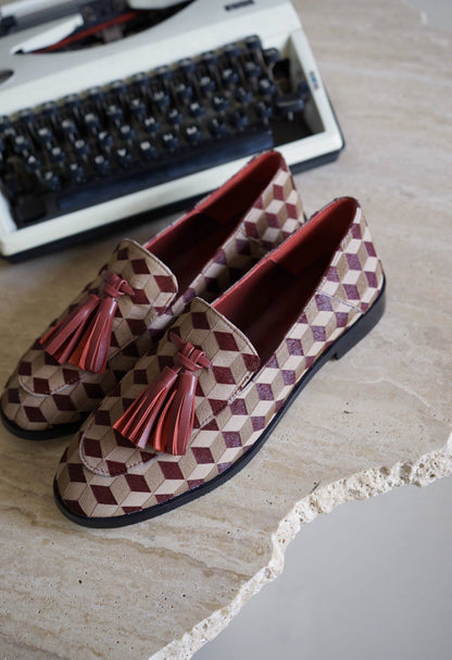 B-FEI British-style round toe loafers.