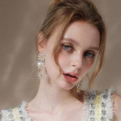 Wardrobes by Chen Elegant Gold Sun Flower Diamond Earrings-Unii