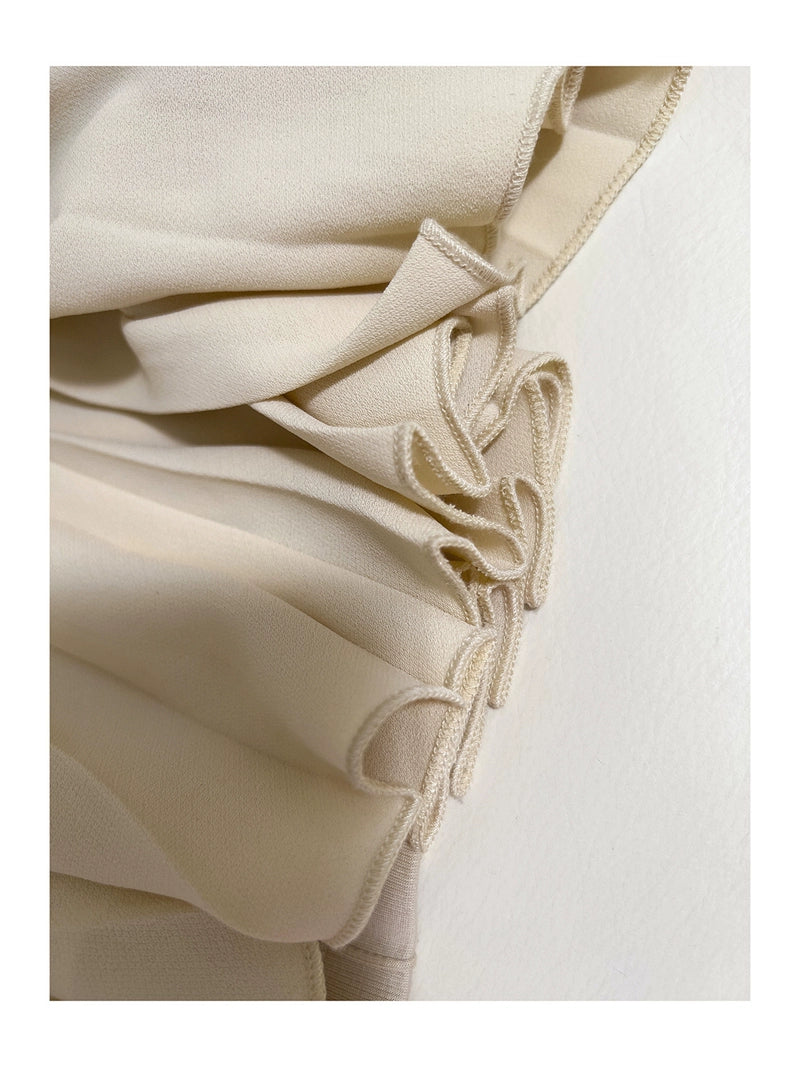 Highend sleeveless beige side pleated dress - Amira