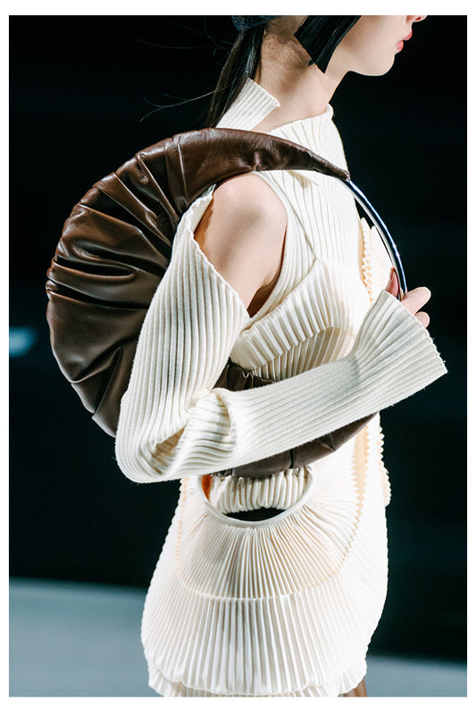 MAYALI BRAND X TOGGLER SEMI-CURVED PLEATED ONE-SHOULDER BAG IVDI