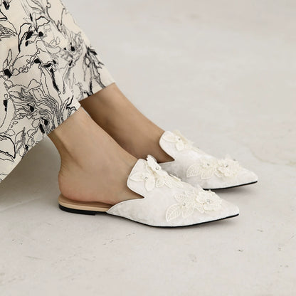 B-FEI pointed toe flower embossed flat mules -OPERT.