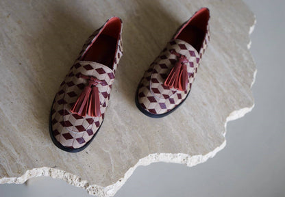 B-FEI British-style round toe loafers.