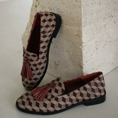 B-FEI British-style round toe loafers.