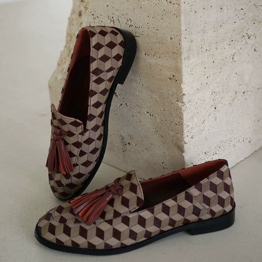 B-FEI British-style round toe loafers.