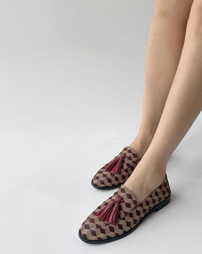 B-FEI British-style round toe loafers.