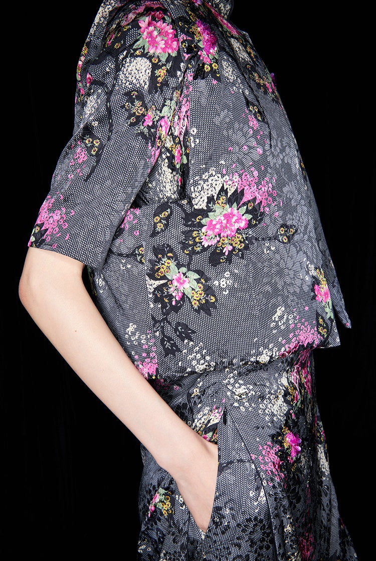 M essential Mackay designer cherry blossom print beads down short vest - LAND.