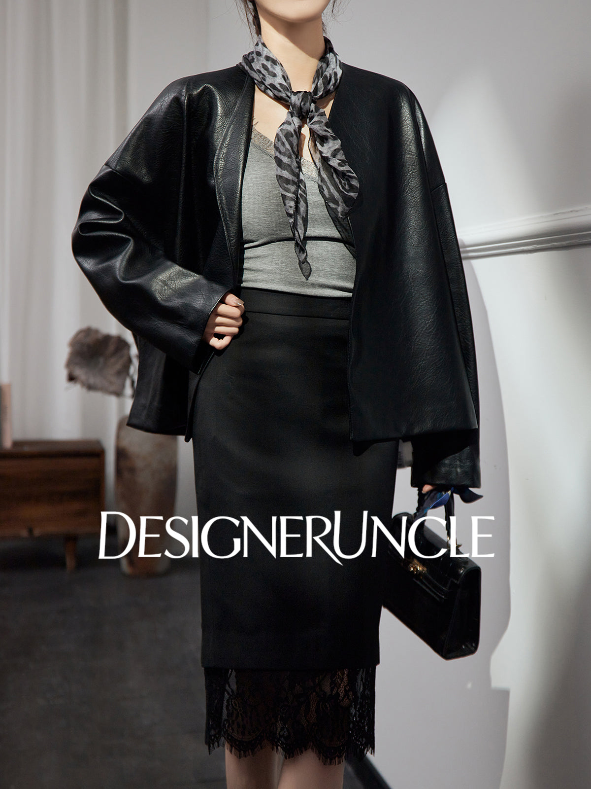 DGU High-end black leather silhouette niche sense commuting high-end style dress - Claude.
