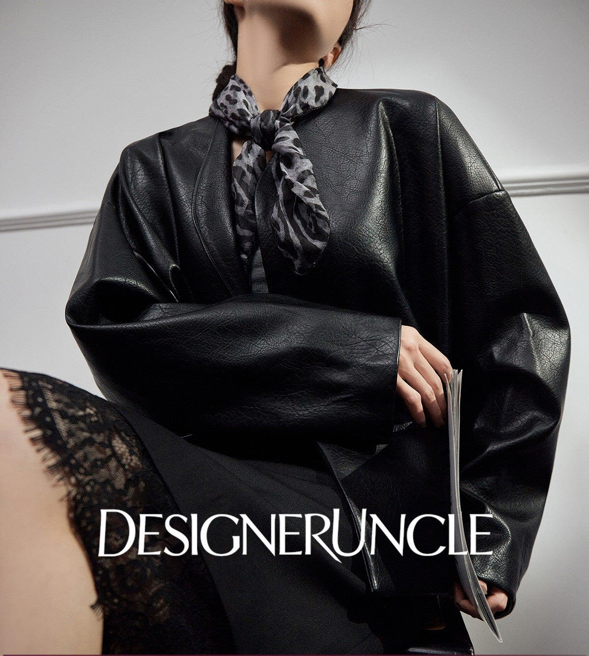 DGU High-end black leather silhouette niche sense commuting high-end style dress - Claude.