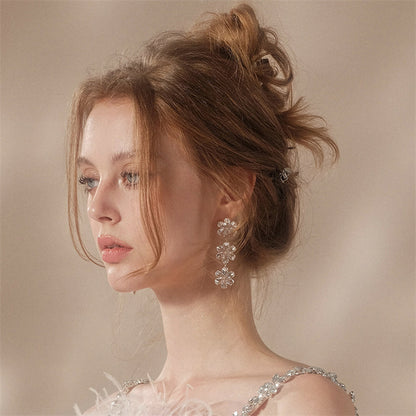 Wardrobes by Chen Elegant Gold Sun Flower Diamond Earrings-Unii