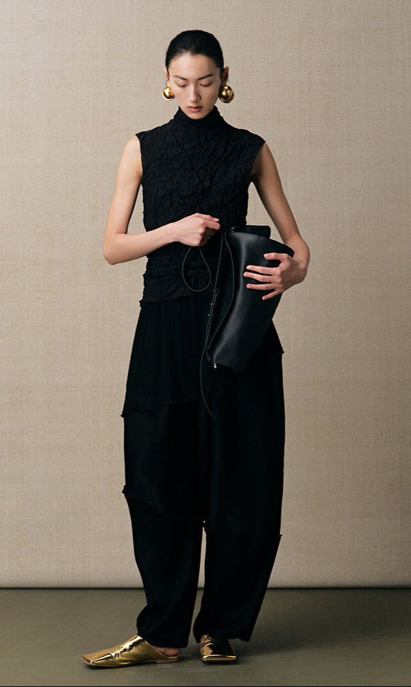 ZHUCHONGYUN black pleated three-dimensional divider tapered trousers-HYSE.
