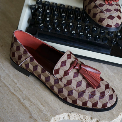 B-FEI British-style round toe loafers.