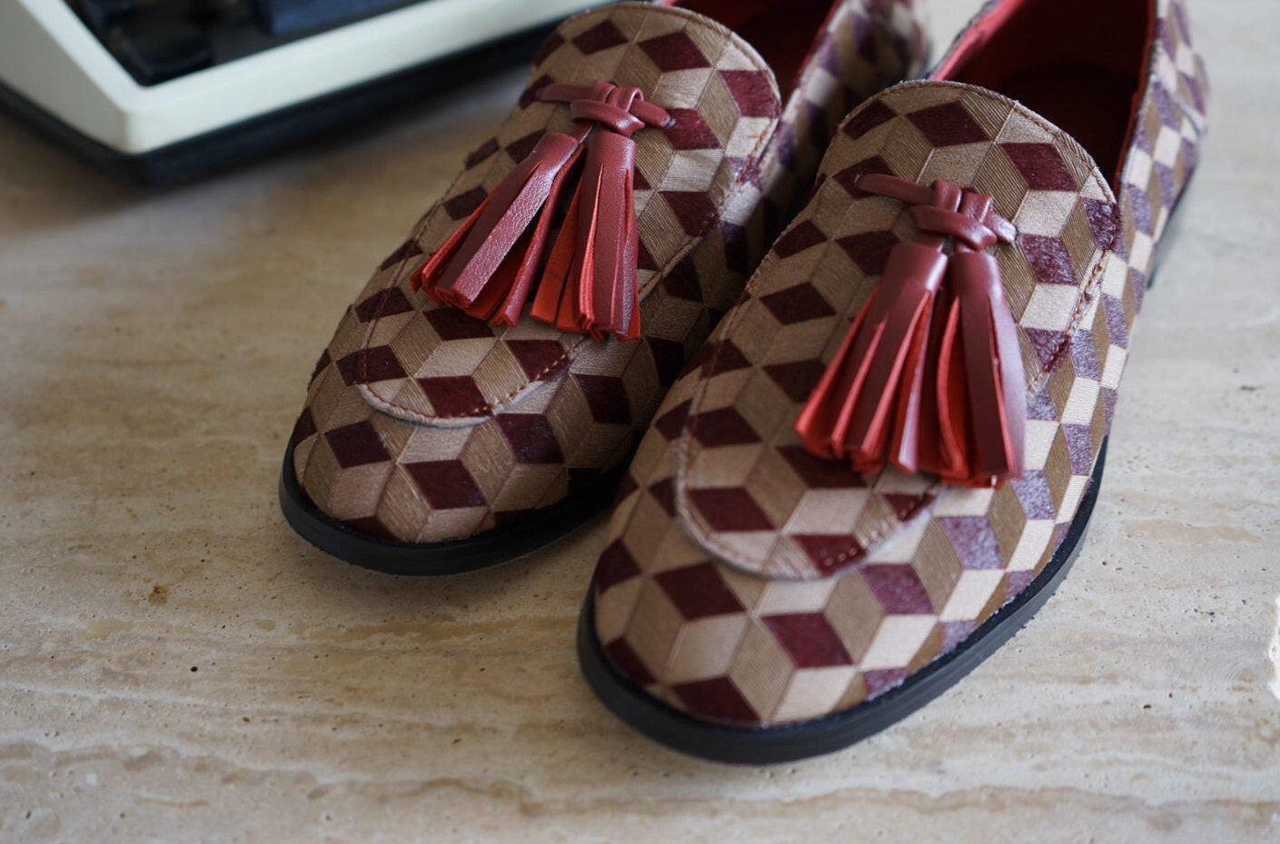 B-FEI British-style round toe loafers.
