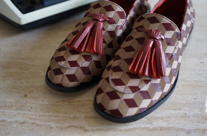 B-FEI British-style round toe loafers.
