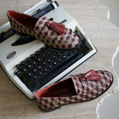 B-FEI British-style round toe loafers.