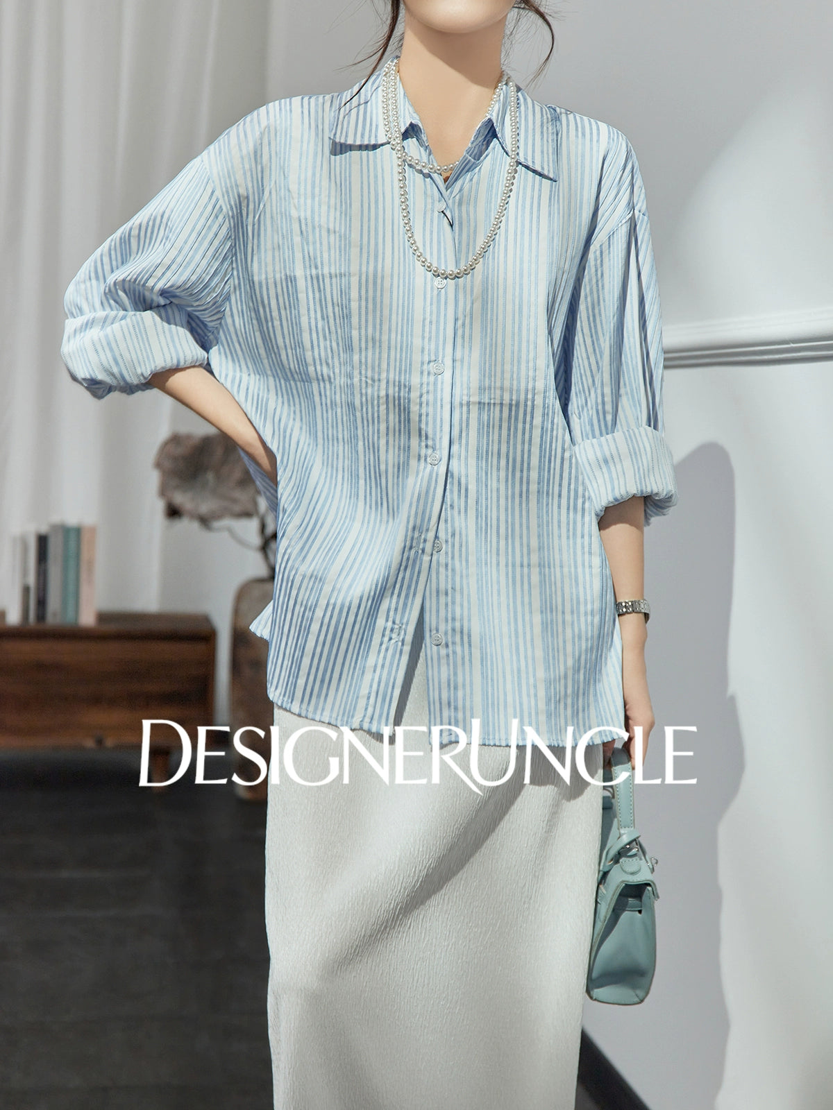DGU| Blue Knitted Loose Vertical Light Luxury Commuter Fan Niche Design Top - George.