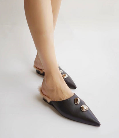 B-FEI black leather single shoe with metal buckle.