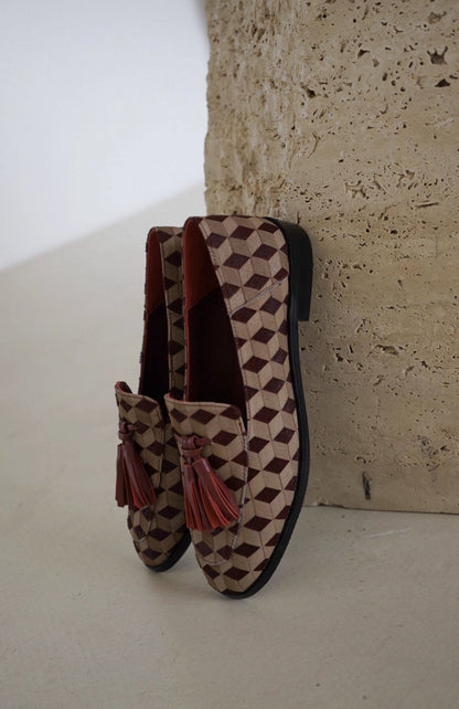 B-FEI British-style round toe loafers.