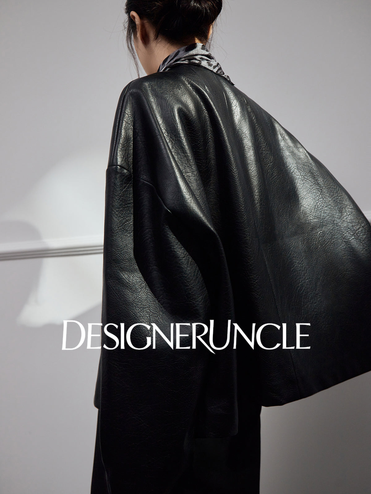 DGU High-end black leather silhouette niche sense commuting high-end style dress - Claude.