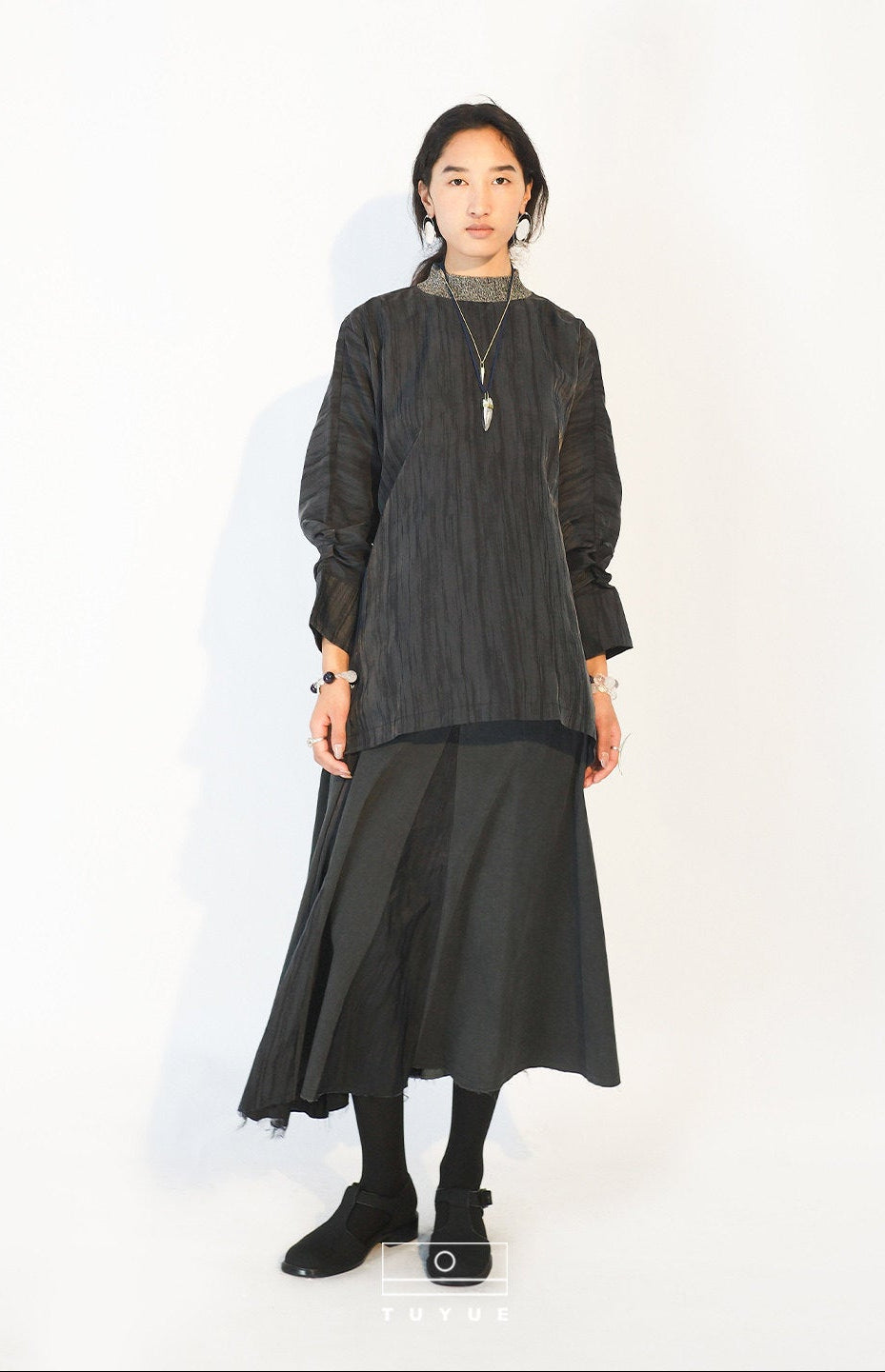 TUYUE Black Textured Multi-Cut A-Line Midi Skirt - NIMWE.