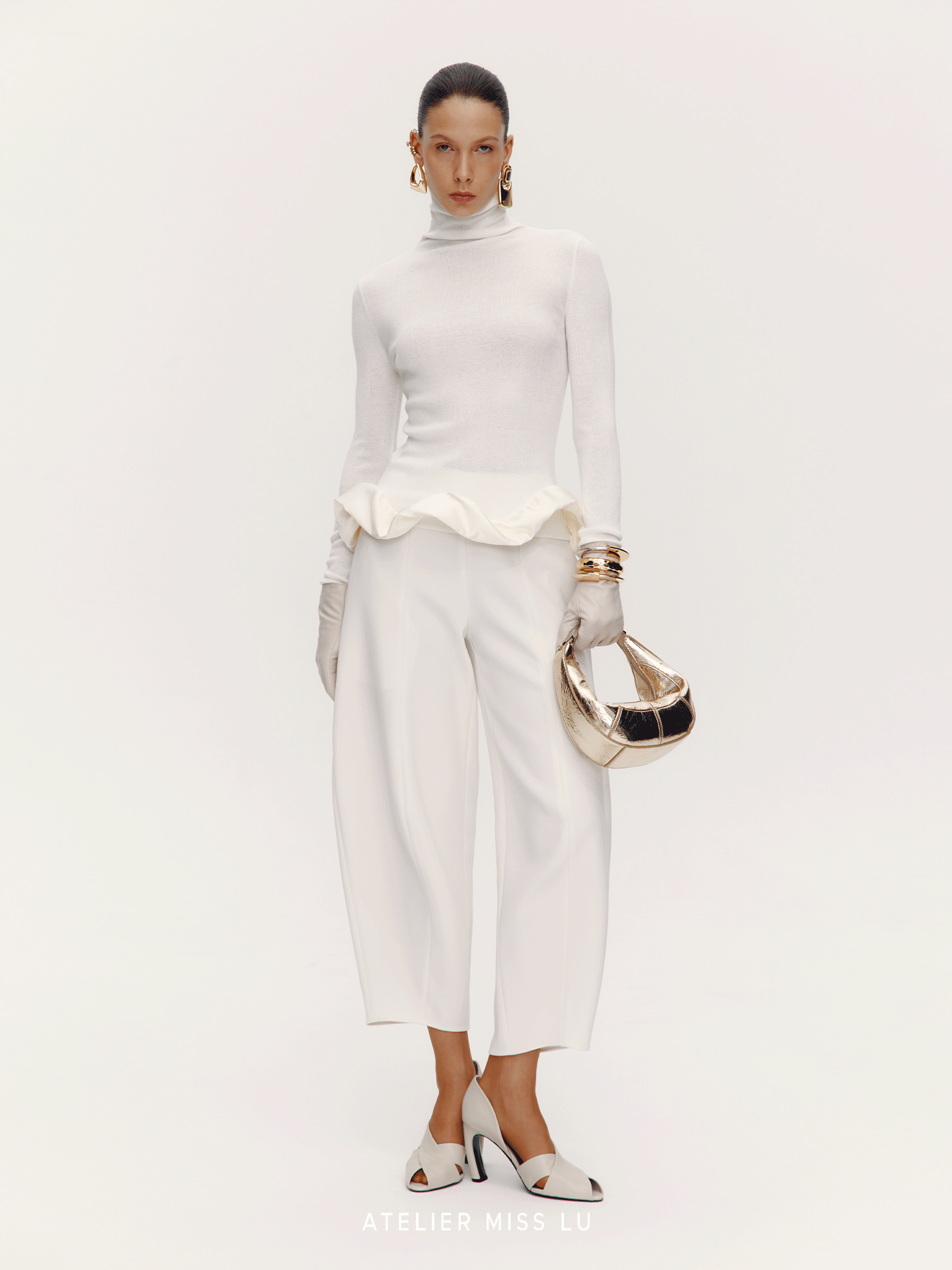 AtelierMissLu Hem clouds surround turtleneck knitted top - HERE.