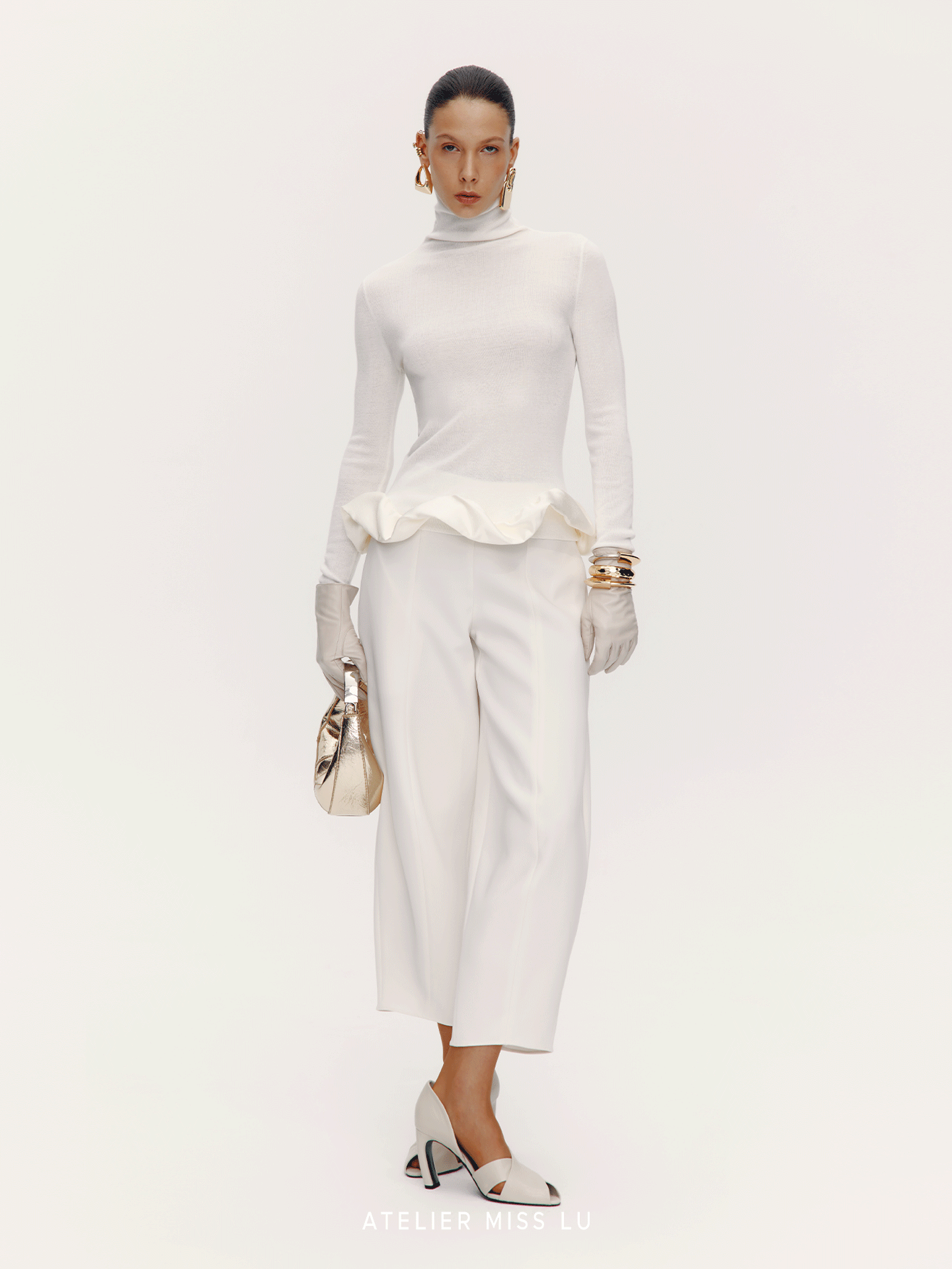 AtelierMissLu Hem clouds surround turtleneck knitted top - HERE.