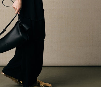 ZHUCHONGYUN black pleated three-dimensional divider tapered trousers-HYSE.