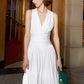 Luxurious blend of silk a hanging neckline, and sleeveless  V-neck dress- Besame